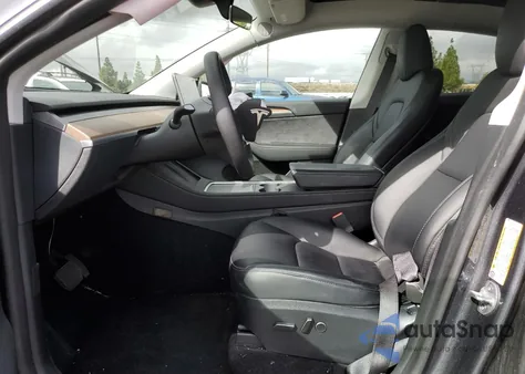 2023 Tesla Model Y из США, поврежденный, VIN 7SAYGDED2PF949131